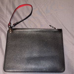 Louboutin pouch
